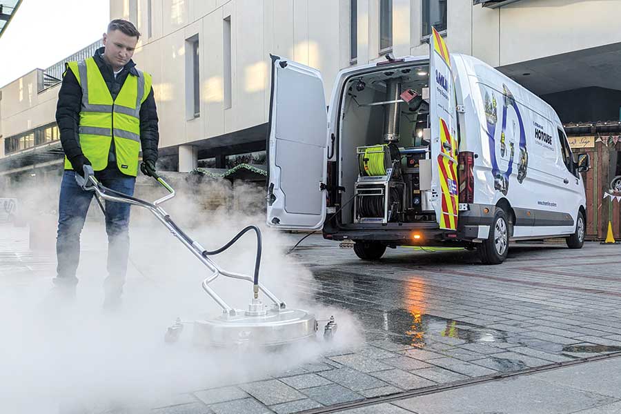 Pressure Washing Van with operator using flat surface pressure cleaner, Princess Hay Exeter